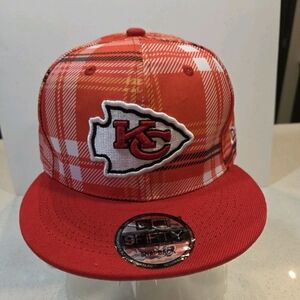 Kansas City Chiefs New Era Red Plaid Snapback Hat.